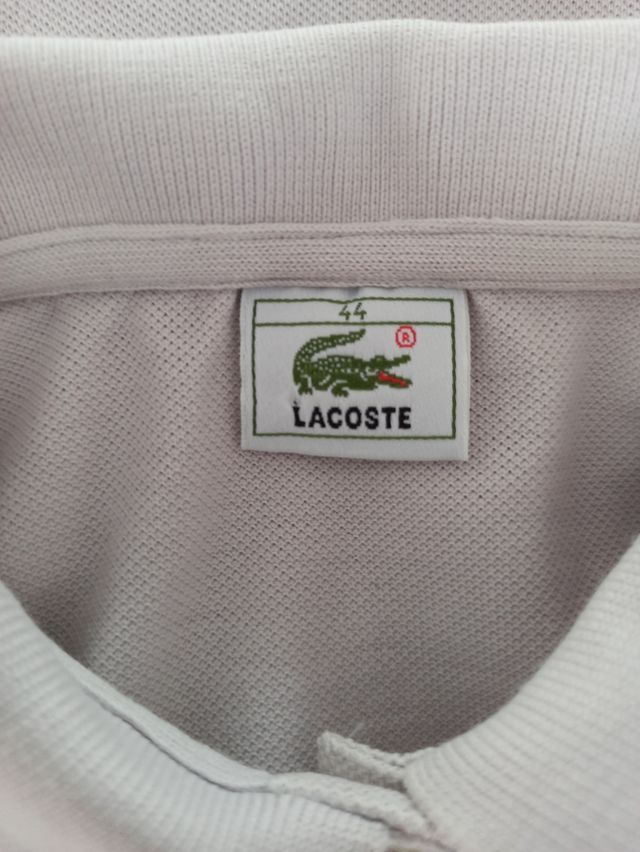 Polo Lacoste sin mangas lila