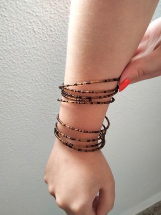 Pulsera espiral marrón-dorada