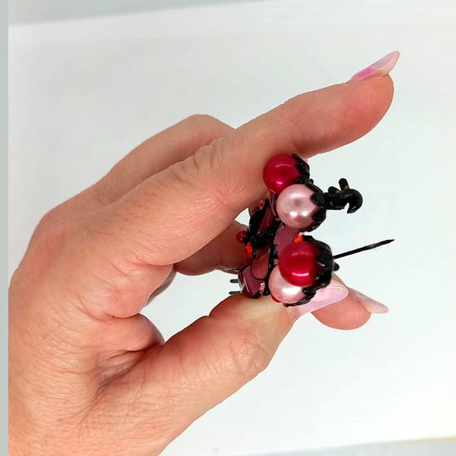 Broche flores rosa y rojo