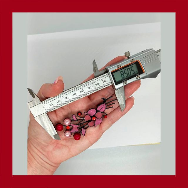 Broche flores rosa y rojo