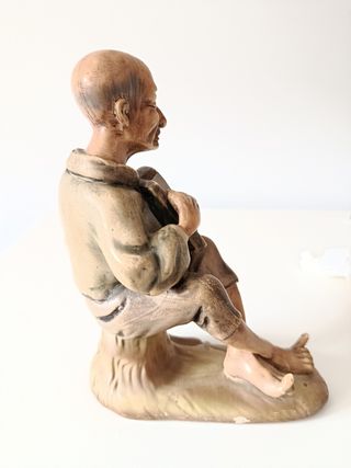 Figura porcelana acordeonista