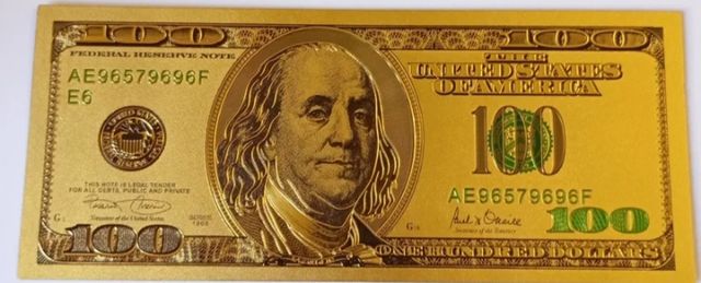 Nota de 100 dólares em ouro