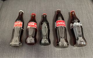 5 bottiglie di Coca-Cola, provenienti da diversi paesi