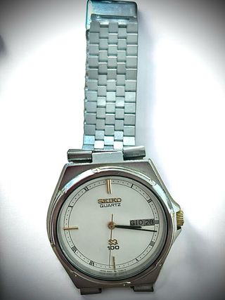 Reloj Seiko SQ100 Vintage