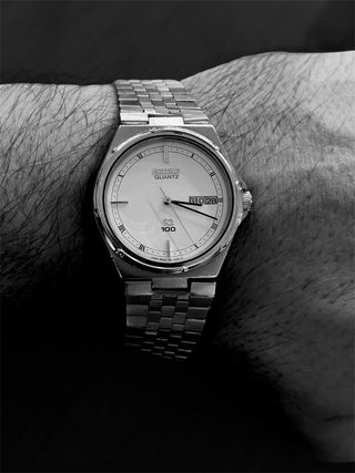 Reloj Seiko SQ100 Vintage