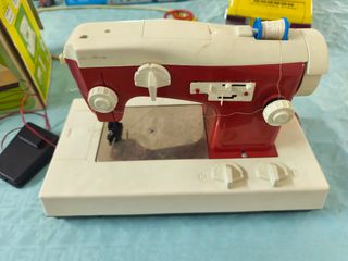 Máquina de coser eléctrica Román