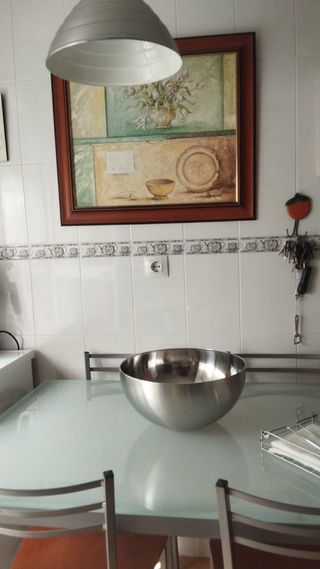 Mesa de cristal + 4 sillas