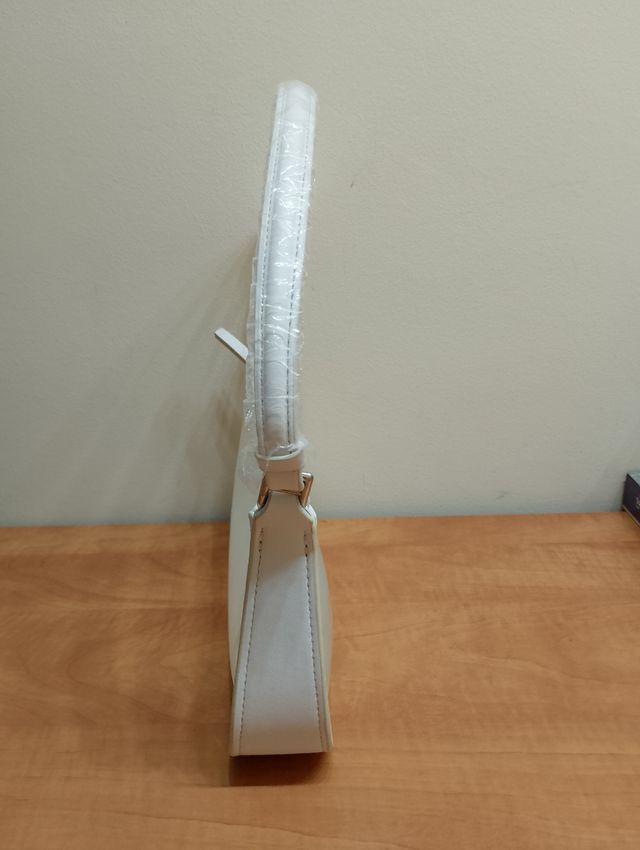 Bolso blanco semi transparente