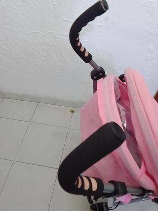 Carro bebé rosa plegable