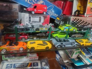 Lote 1:43 - Camiones y Coches regado dos coches