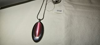 Colgante ovalado rosado (ojo de gato)