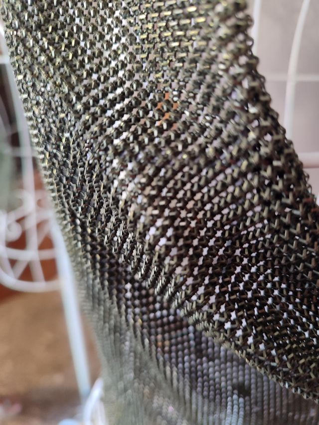 Top brillo festivalero negro cobre.