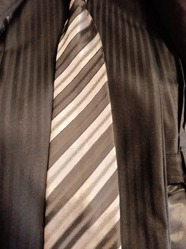 Traje negro raya diplomática