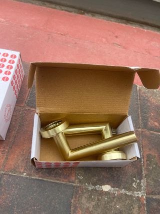 Manivela dorada con roseta