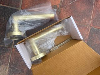 Manivela dorada con roseta