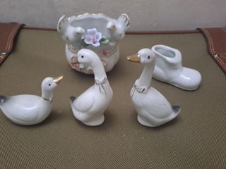 Set di statuine in porcellana a forma di papera