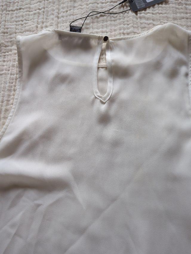 Blusa/ Top
blanco roto de Primark talla 38.