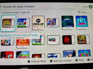 Nintendo Switch OLED Blanca con accesorios.