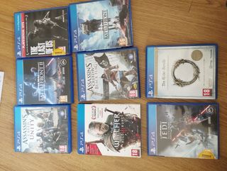 PS4 (PlayStation 4) negra + mando sony + juegos