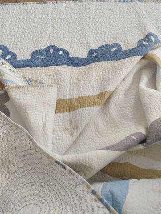 Trapunta matrimoniale beige e blu