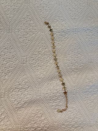Pulsera estrellas dorada