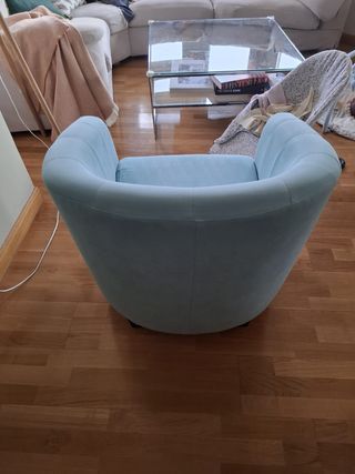 Sillón turquesa de tela