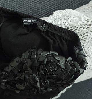 Abito nero décolleté Artigli