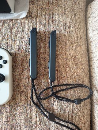 Nintendo Switch OLED blanca y negra. Como nueva