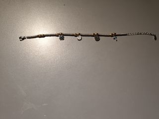 Pulsera dorada y plateada