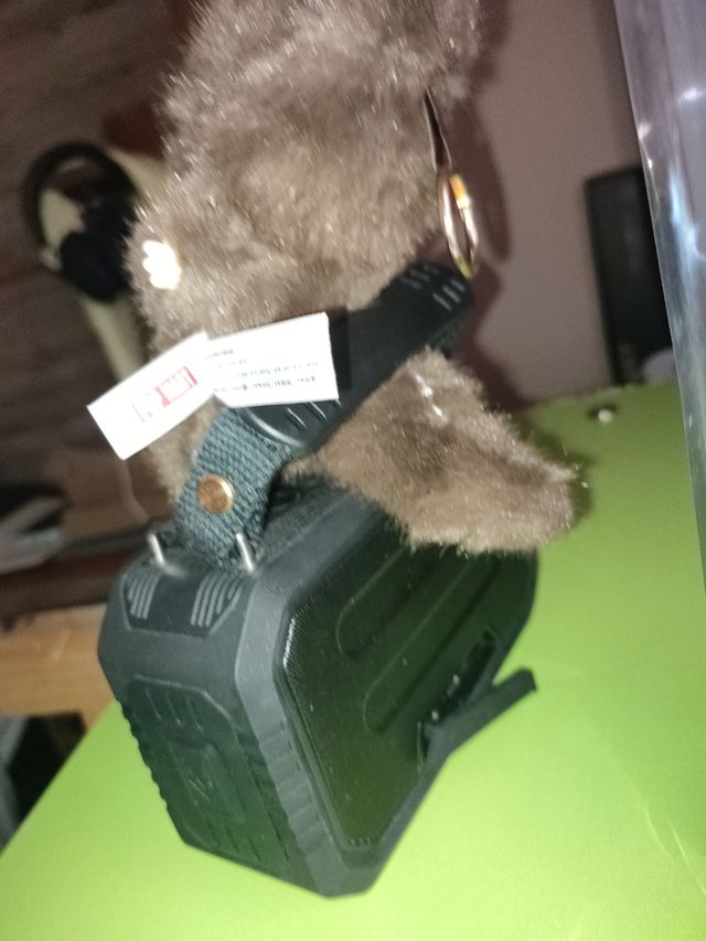 Negociable .Zimomo marrón con medalla precio negoc