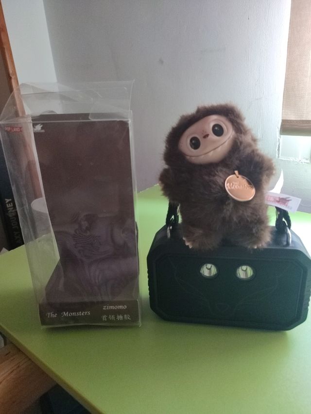 Negociable .Zimomo marrón con medalla precio negoc