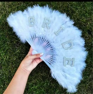 Abanico plumas novia blanco
NUEVO