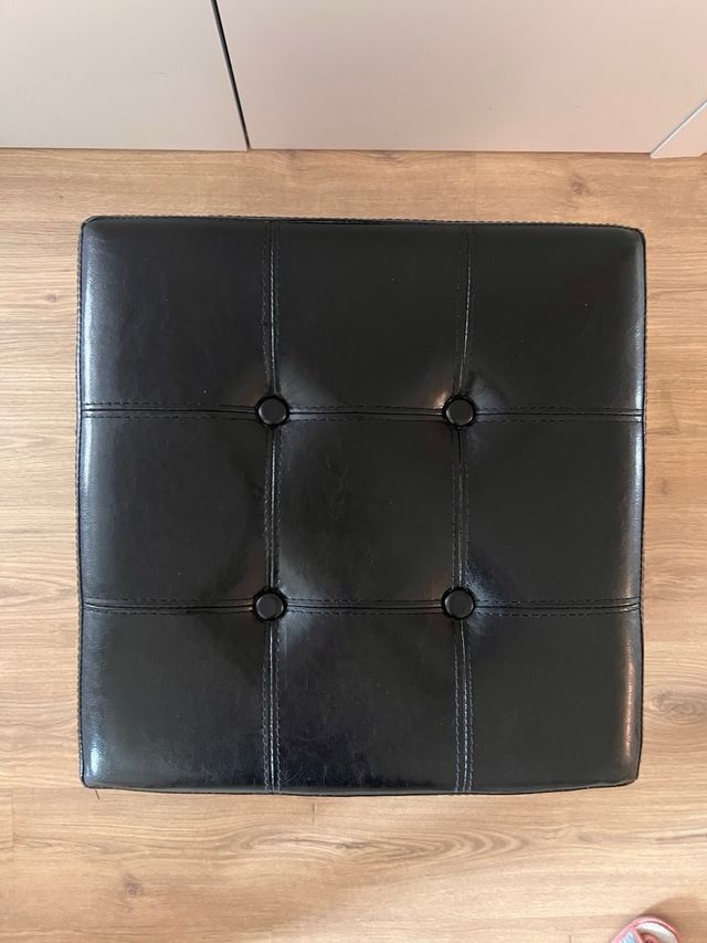Asiento puf negro almacenaje plegable