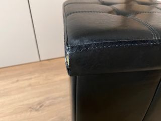 Asiento puf negro almacenaje plegable