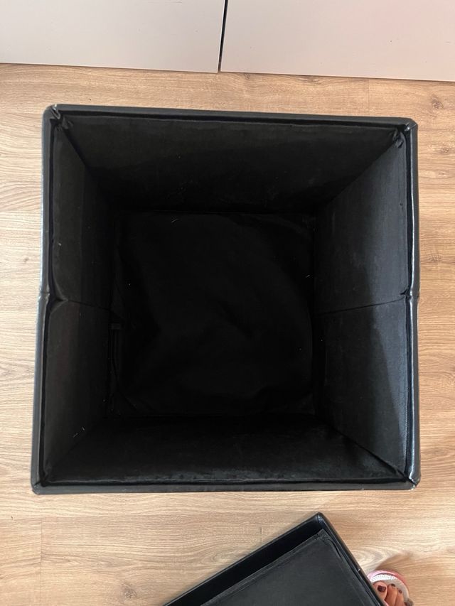 Asiento puf negro almacenaje plegable