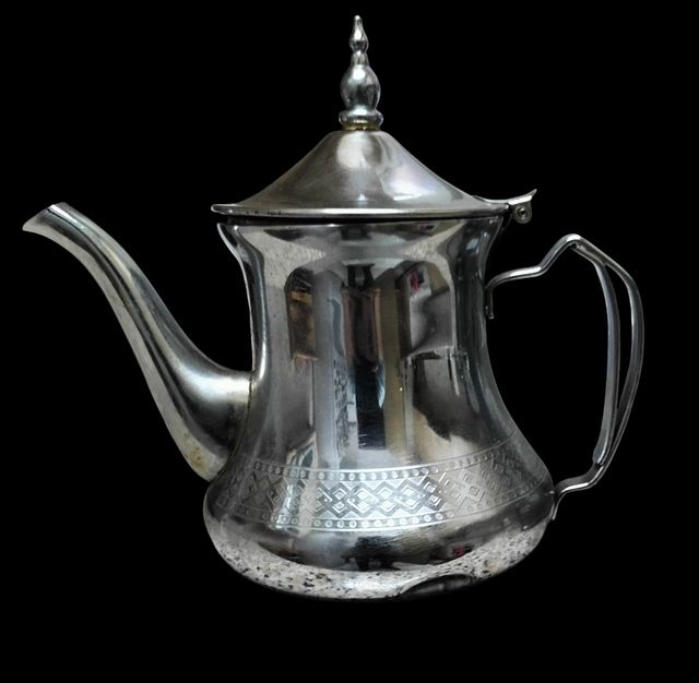 Teiera metallica argentata