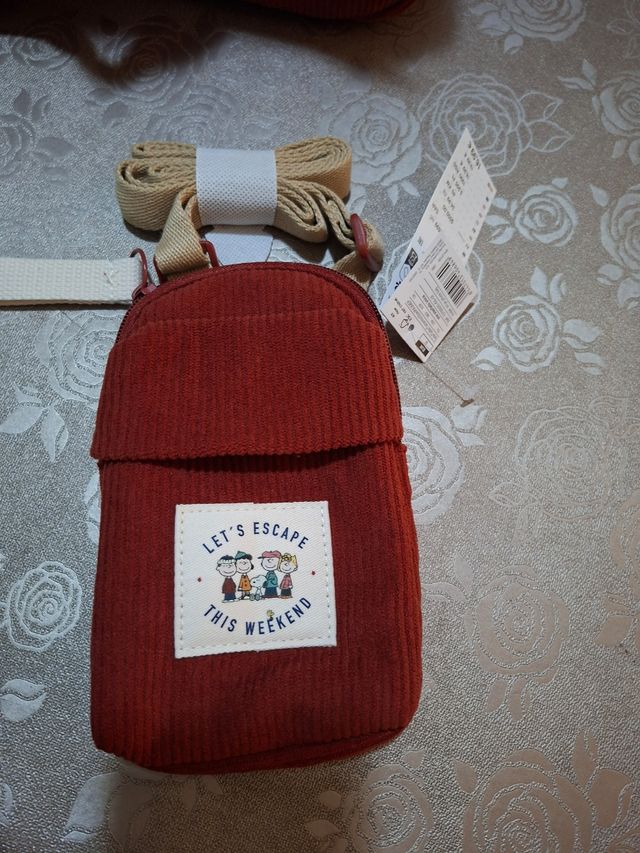 Conjunto snoopy de women secret con etiquetas 