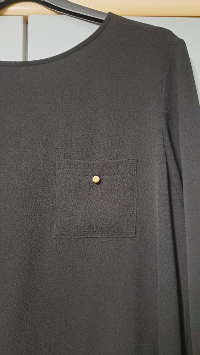 Blusa negra elegante