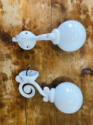 Lampade da parete in ghisa laccata 