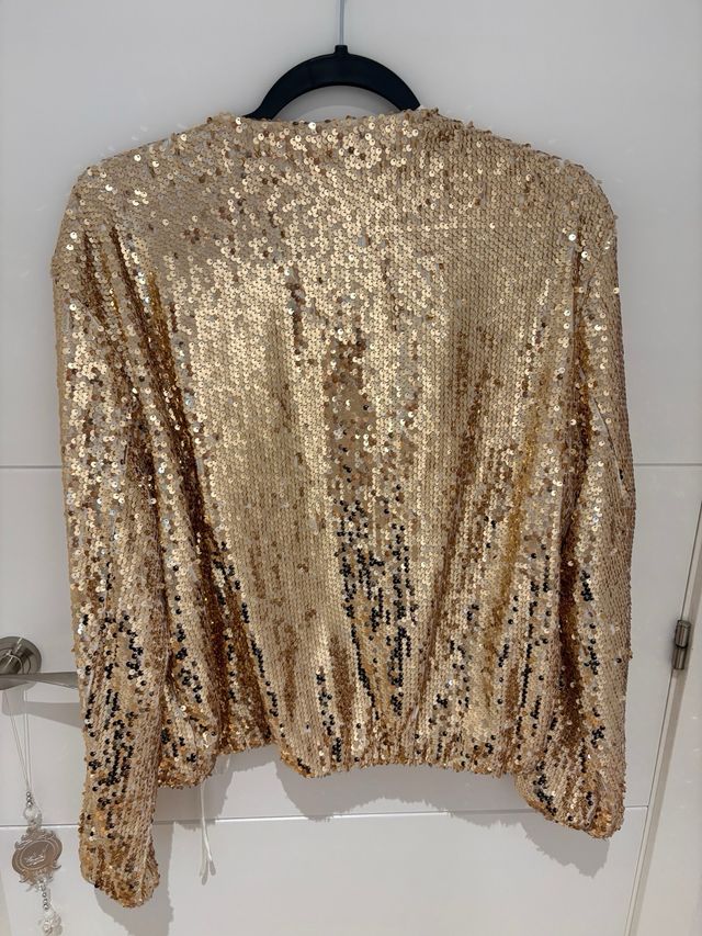 Chaquetilla dorada lentejuelas