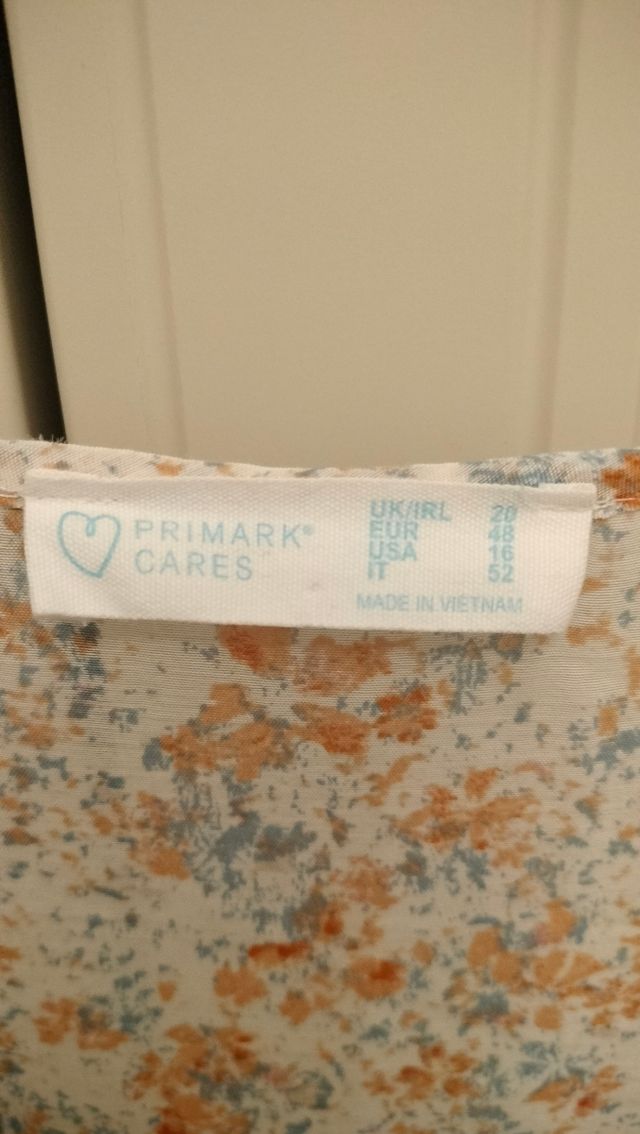 Blusa azzurra maniche lunghe