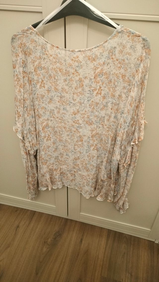 Blusa azzurra maniche lunghe