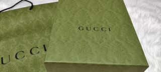 Caja y bolsa Gucci 