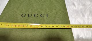 Caja y bolsa Gucci 