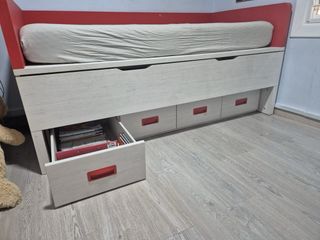 Cama nido infantil roja y blanca, armario a juego