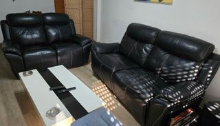 Sofá de piel negro reclinable