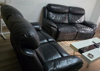 Sofá de piel negro reclinable