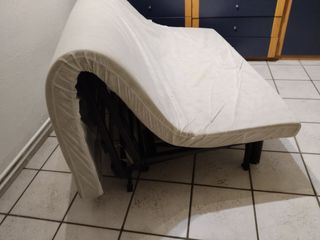 Sofá cama naranja plegable