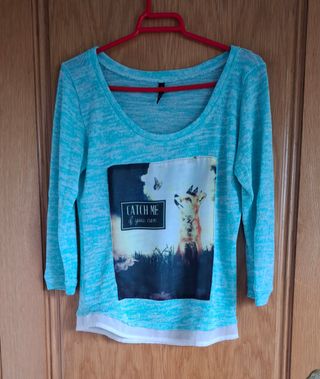 Suéter turquesa con estampado de zorro