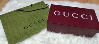 Caja y bolsa Gucci